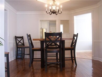 Formal dining room off the kitchen featuring conve