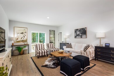 Living room featuring light hardwood / wood-style 