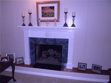 Gas log fireplace in living room