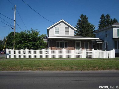 Exterior Front. Fenced front yard