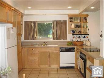 Beautiful kitchen with newer cabinets and pantry,