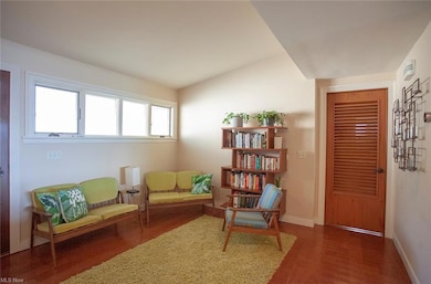Enter into this large foyer with its vaulted ceili