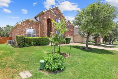Traditional home with brick siding, central air c