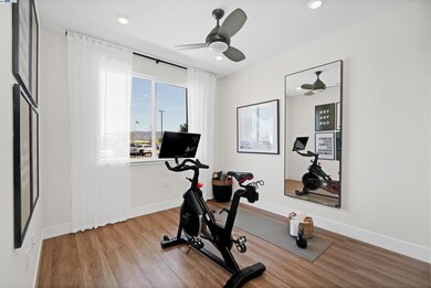 Downstairs Bdrm - Model home shown. Actual finishes/features/location vary from those in photos.