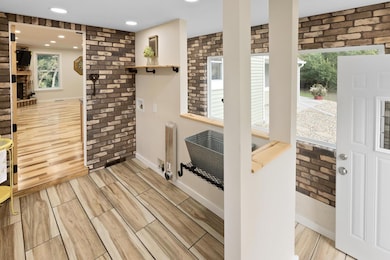 Laundry hookups right off the kitchen, on the main level add convenience for all.