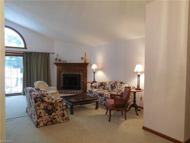 Neutral great room with gas fireplace!