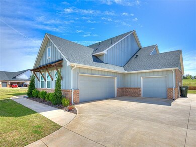 Side garage entrance with 3rd car garage that has 