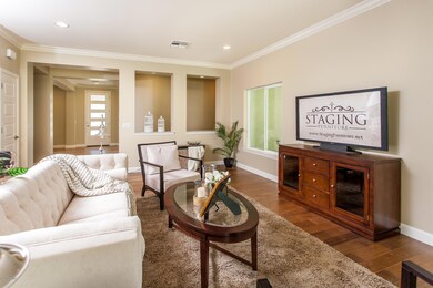 Formal living room w/ crown molding