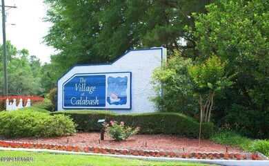 village at calabash sign