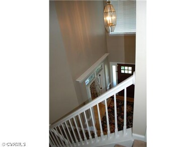 Foyer - Elegant front staircase.  The back stairca