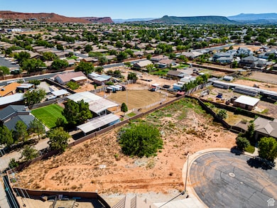 Aerial view of residential area with a mountain backdrop