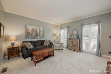 Lovely living room with NEW windows, NEW plantatio