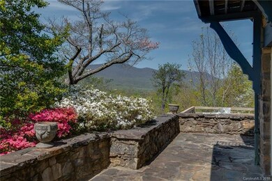 Side view w/ surrounding mountain vistas.