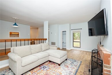 Living room with light hardwood floors