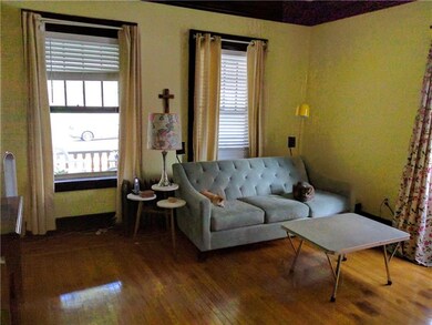The sunny and bright living room makes a pleasant 