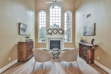 Formal living room with gas log fireplace