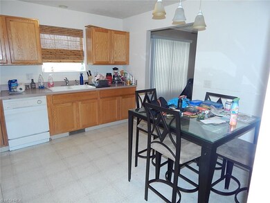 Range, microwave and dishwasher included