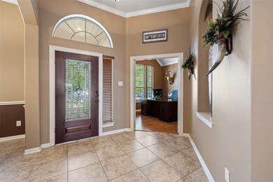 There is a spacious study conveniently located off the entry!