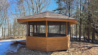 View of outdoor structure featuring a gazebo