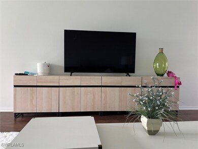 Detailed view of baseboards and wood finished floors