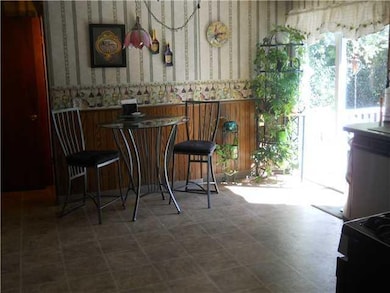 Kitchen Nicely updated eat in kithen with sliding 
