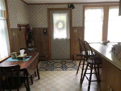 Kitchen area looking towards entry door