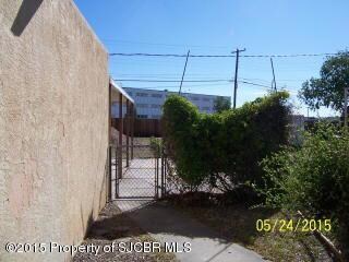 Fenced yard side gate