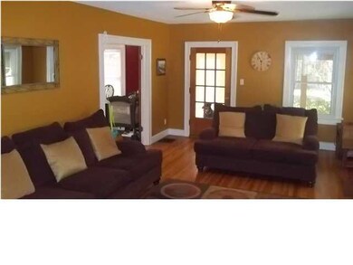 Original doors w/ crystal door knobs add to the ch