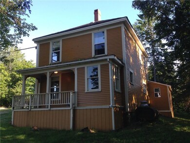 Front angle view of house with...