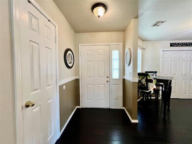Entryway with wood flooring