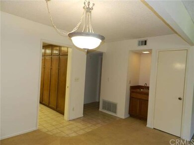 Formal dining area outside of the kitchen with wet
