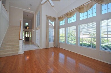 Drapery has been removed from family room windows.