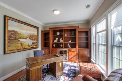 Front living room/office. Built-in bookcases, and a Sub Zero wine cooler.