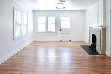 Unfurnished living room with a fireplace, a wealth