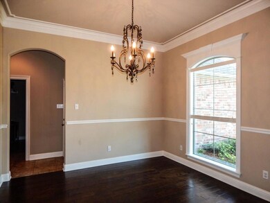 This view of the dining goes to a hallway to the k
