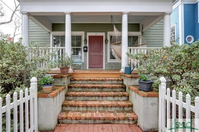 Large front porch for welcoming guests and just en