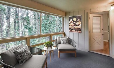 Sunroom / solarium featuring a wealth of natural l