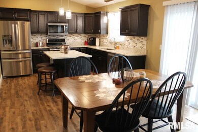 1268 W 61st St, Davenport, IA 52806 - photo 2