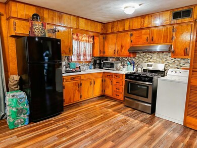 Kitchen featuring stainless steel appliances, sink