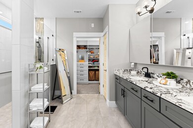 Stunning primary bath- with seldom seen streamlined medicine cabinet mirrors.