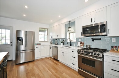 Stainless steel appliances , new cabinets and coun