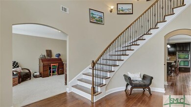 Foyer looking into study and kitchen
