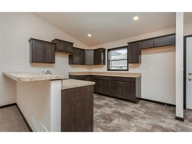 View of Kitchen with raised Breakfast Bar