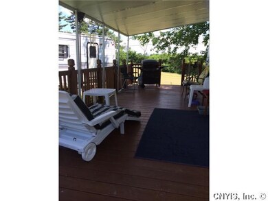 Deck Custom stained deck with awning