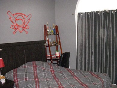 A nice view of the third bedroom also has large closet and carpet