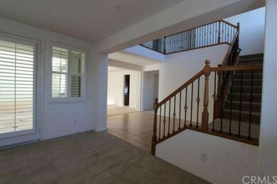 Formal living room with french doors and lots of w