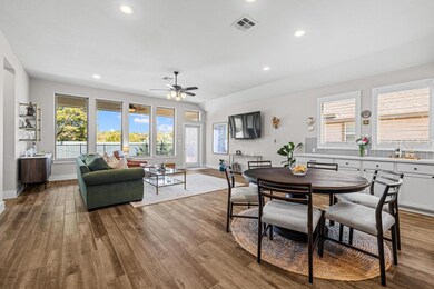 Dining room with recessed lighting, visible vents