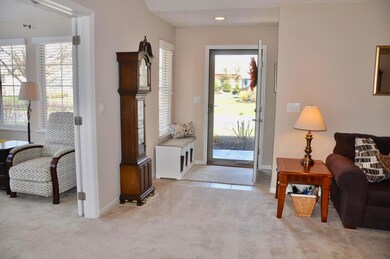 View inside to front door entryway