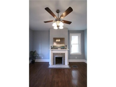 Living Room. Charming living room with original fi