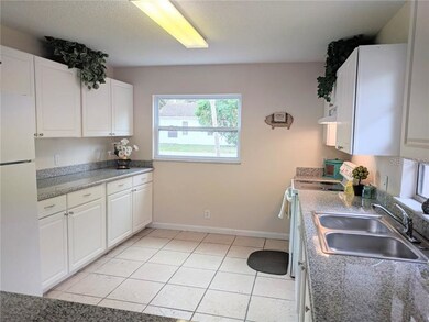 KITCHEN W/ GRANITE COUNTERS, NEWER CABINETS AND CE
